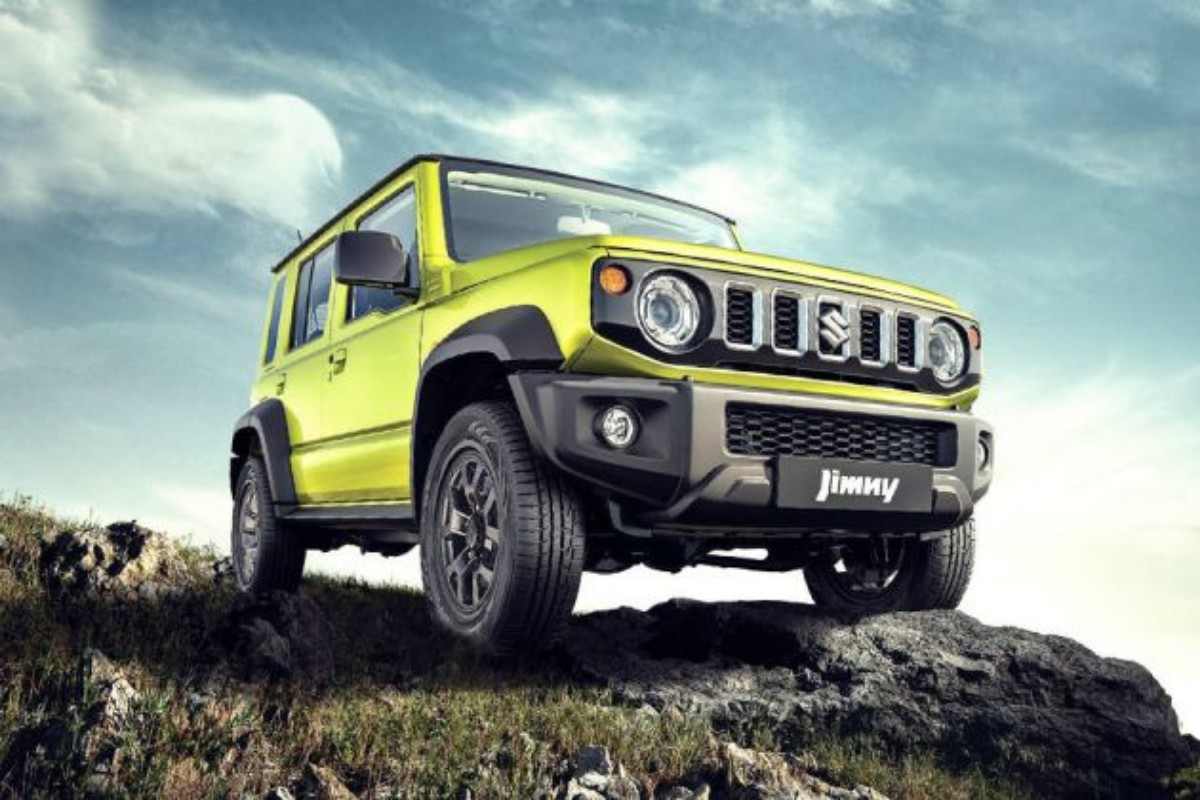 Maruti20Suzuki20five door20Jimny20compact20SUV20parked20outdoors20showing20front20and20side20profile20with20off road20wheels20and20rugged20design 3